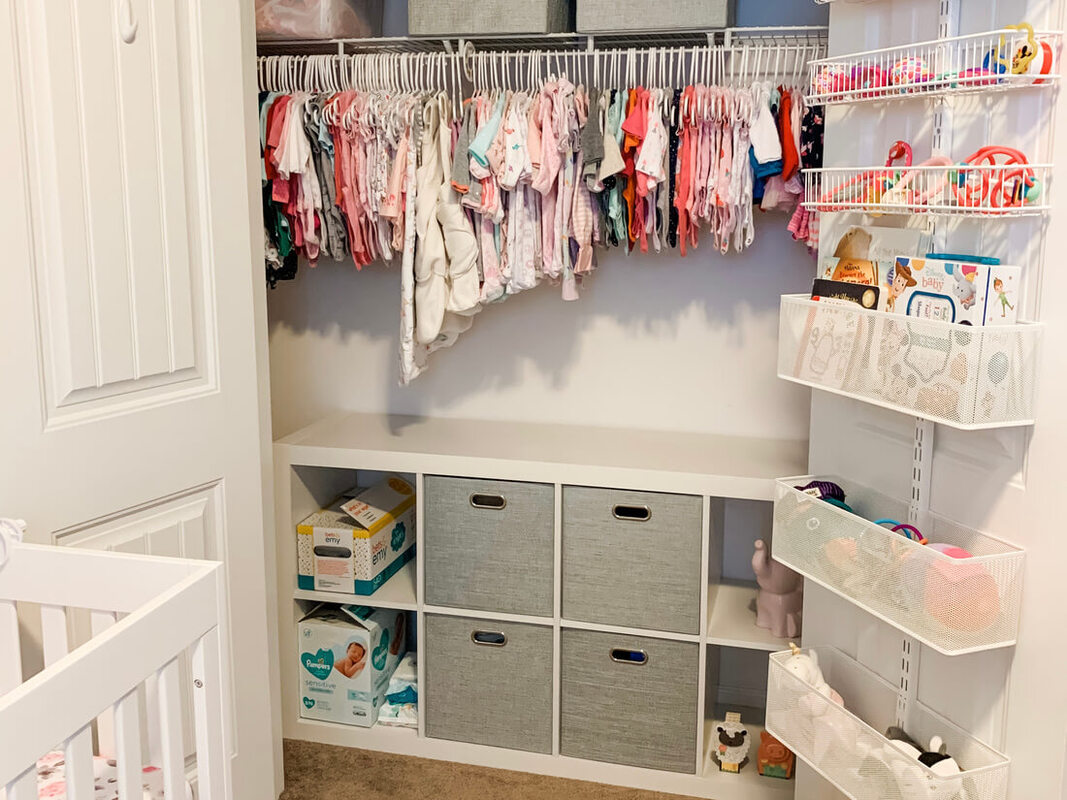 nursery closet unpacked and organized by professional organizers in cary nc